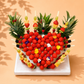 Coeur de fraise et brochettes de fruits